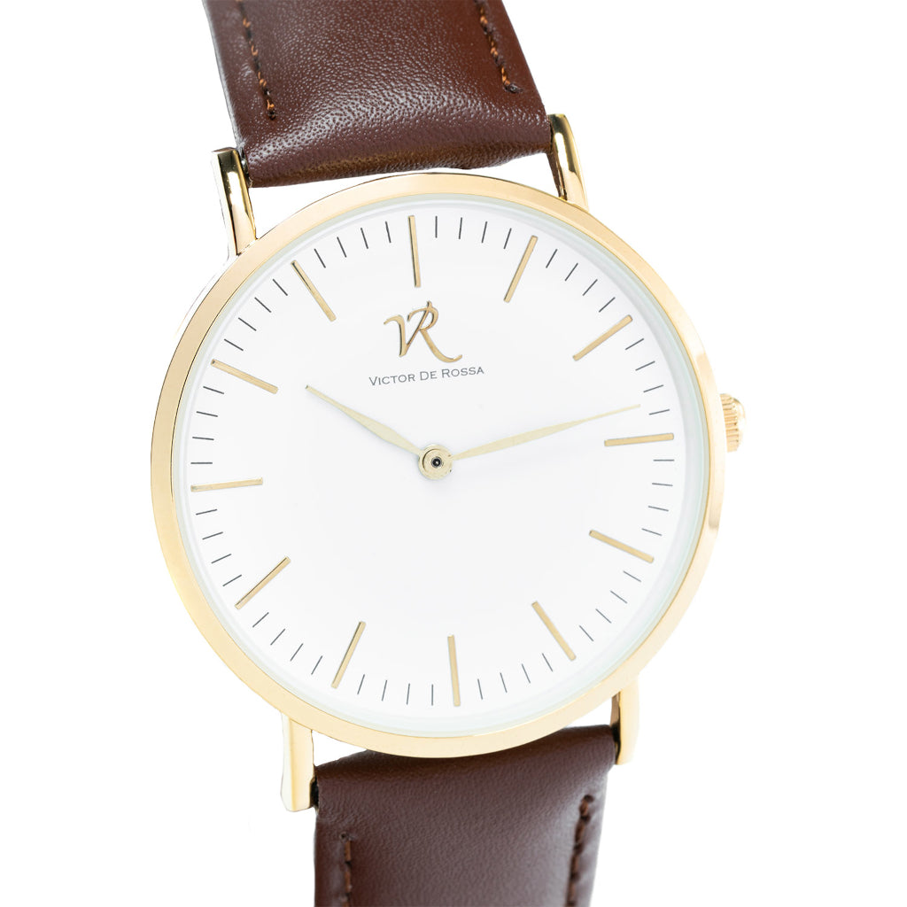 Victor De Rossa Uhr vom Modell „Aperto 401“. Unisex-Uhr mit braunem Lederarmband, weißem Zifferblatt und goldenem Gehäuse